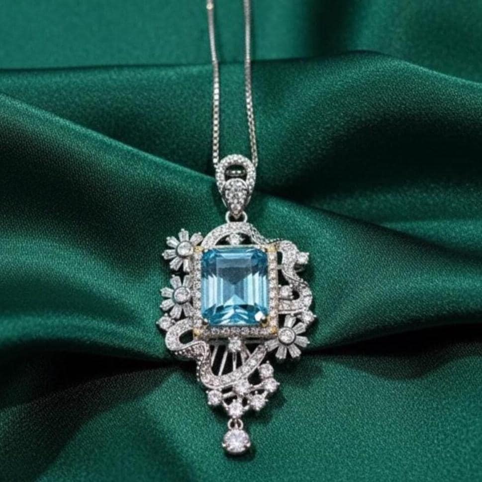 Emerald Cut Aquamarine Halo Pendant