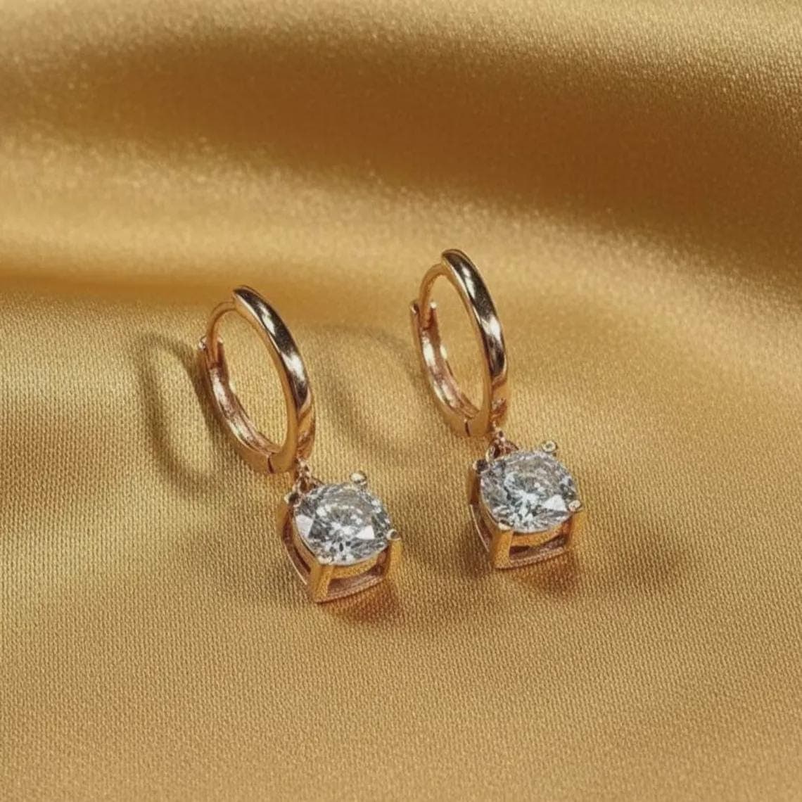 Dainty Round Cut Moissanite Huggie Hoops — View 2